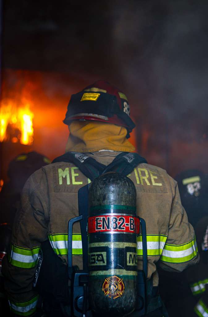 Firefighter from 82B turned out in smoke.